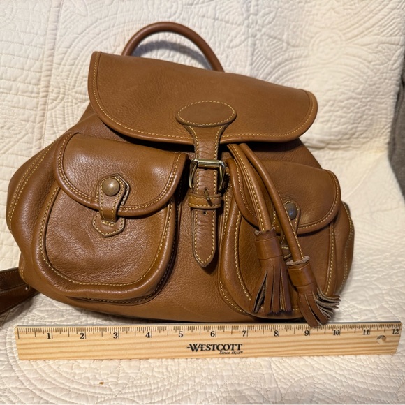Dooney & Bourke tan pebbled leather drawstring backpack - Picture 3 of 11